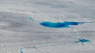 Melt Ponds at the Greenland’s Ice sheet margin, flight to Kangerlussuaq, end of June 2012. (Source: Sepp Kipfstuhl )
