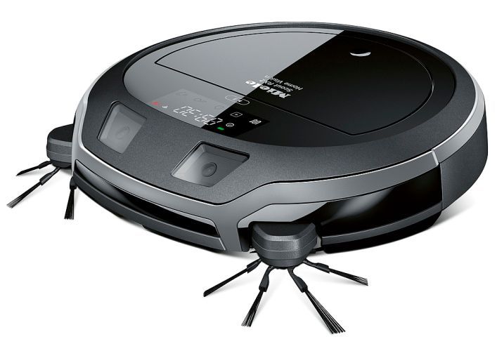Red Dot Produktdesign 2018: Saugroboter Scout RX2 von Miele: Bei diesem Saugroboter erzeugen zwei Frontkameras ein Stereobild für eine präzise Navigation. Zudem schützen vorne sieben Infrarotsensoren vor Kollisionen, während drei Sensoren am Geräteboden Abstürze verhindern. Neben einer intelligenten Navigation bietet der Saugroboter eine verstärkte Staubaufnahme auf Teppichen sowie eine Saugleistung von bis zu zwei Stunden. Der Scout RX2 ist vernetzt und kann über eine App gesteuert werden, zudem überträgt die Home Vision-Variante Live-Bilder aufs Tablet oder Smartphone. Begründung der Jury: Aufgrund seiner technischen Raffinessen bietet dieser neue Saugroboter ein hohes Maß an Komfort und Funktionalität.  (Bild: Red Dot/Miele)