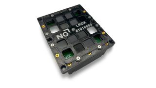 The casing for the radiation experiment made of the FDM material Antero 840CN03 with test samples for shielding radiation, including the tungsten-filled Stratasys material FDM Antero 800NA (dark gray) and the SL Somos PerFORM material (white). (Image:Stratasys)