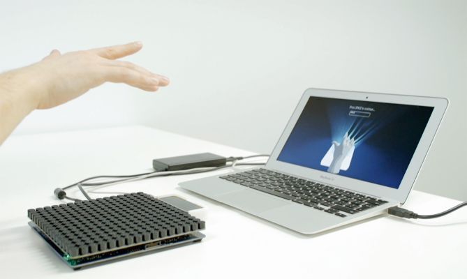 Figure 6: By combining off-the-shelf ultrasound transducers and gesture-recognition technology with advanced software, Ultrahaptics enabled the sensation of mid-air haptic feedback to augment the HMI experience. (Ultrahaptics)