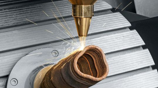 In the field of additive manufacturing, DMG Mori will show at AMB not only the powder-bed process in the form of the 3. Generation Lasertec 30 SLM, but also laser deposition welding on a Lasertec 65 DED hybrid (pictured). (Source:  DMG Mori)