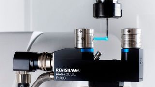 Renishaw's third-generation NC4+ Blue laser tool setter F100 model on machine measuring tool with laser beam (Source: Renishaw)