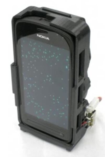Das Display dieses Smartphones zeigt fluoreszierende Teilchen mit einem Durchmesser von 1 µm (Bild: UCLA)