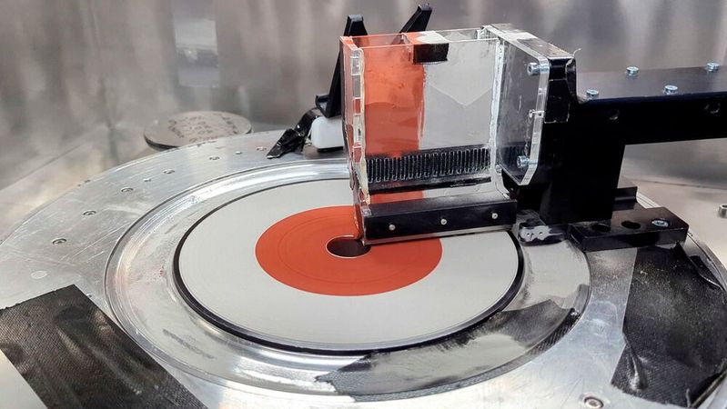 In the new 3D printer, two different materials are simultaneously melted by the laser on the rotating platform.(Image: Michael Tucker / ETH Zurich)