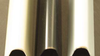 Beschichtete Metalle nach Dornbiegeversuch (Bild: INM)