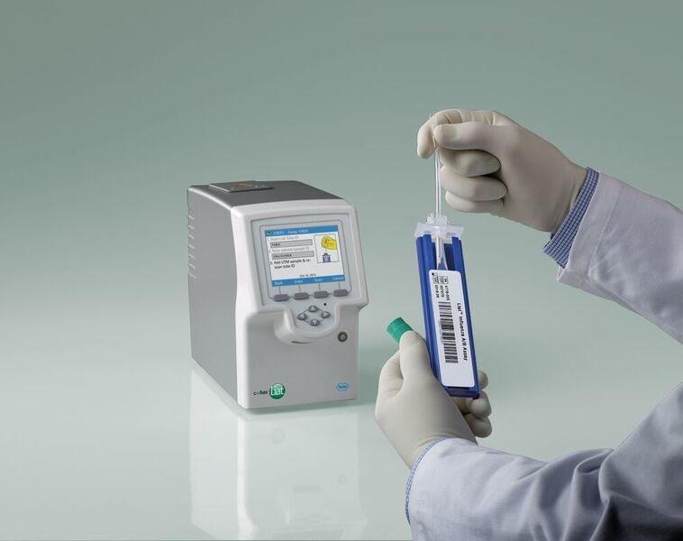 Fig. 4 The Cobas Liat Analyzer uses magnetic beads and real-time PCR for fully automatic pathogen detection. (copyright Carter Dow Photography 2014 / Roche Diagnostics)