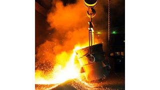 Liquid silicon metal flows out of ladles onto a bed of silicon sand, where it can cool and solidify. (Wacker Chemie)