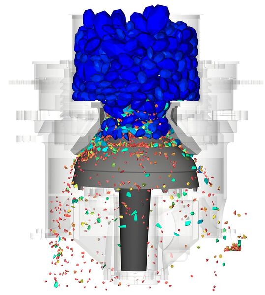 Simulation der Partikelzerkleinerung auf einem Brecher, der Zerkleinerungsgrad wird durch die unterschiedlichen Farben dargestellt. (Bild: Cadfem)