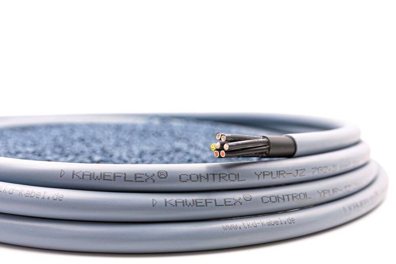 Im Doppel besser – Die Kaweflex Control YPUR-Serie von TKD wartet mit Doppelschicht-Mantel zur besseren Verarbeitung und mit integrierter Verschleißanzeige auf. (TKD Kabel)