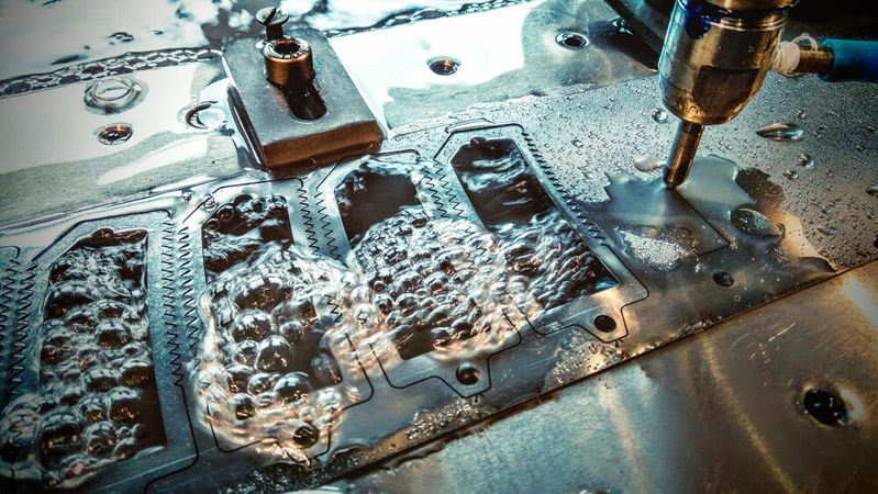 Using water jets with a diameter of 0.2 mm, high pressures and very fine abrasives, the company is able to cut extremely hard or delicate materials without altering them.(Source:  Mitutoyo Europe)