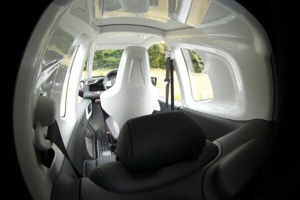 Im Honda Micro Commuter finden zwei Passagiere hintereinander Platz.  (Honda)
