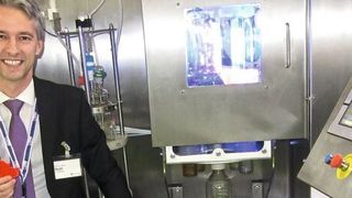 Solar photochemistry pioneer Timothy Noël relaxes amongst flow reactors after receiving the Dechema Prize and delivering his plenary lecture. (Ondrey/CHEMICAL ENGINEERING)