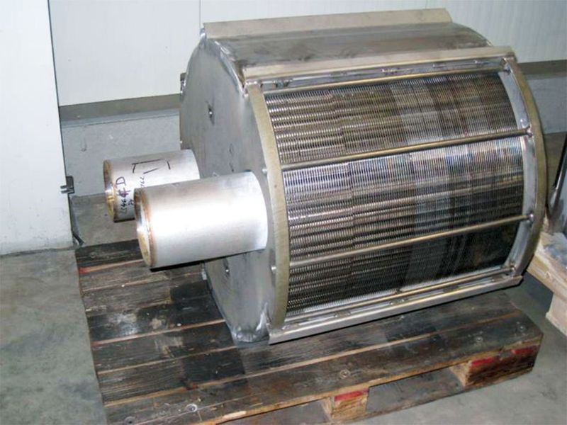 In a conventional plate-and-shell heat exchanger, the plates are compressed between the two thick end plates. The plate pack is kept together by rods on the outside of the pack, and the inlet and outlet tubes are welded to the first plate in the pack. This is a design with many inherent problems and with limited resistance to fatigue. (Alfa Laval)