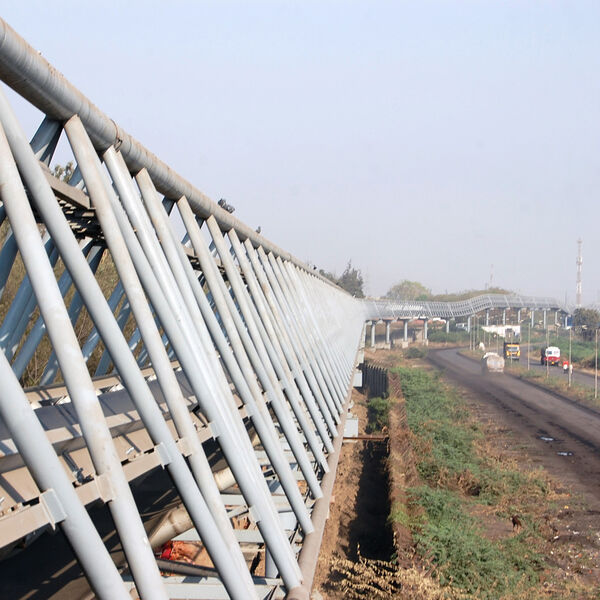 In March 2013 the Adani Group commissioned two high speed, elevated, horizontally curved conveyors which are supported by unusual lightweight triangular galleries spanning 36 metres. (Picture: Conveyor Dynamics)