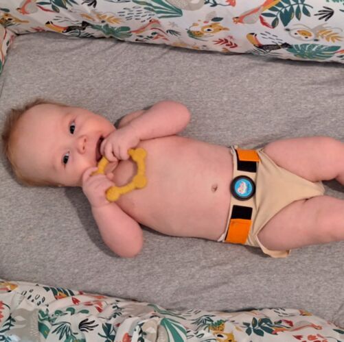 A baby wearing the Nappa sleep-tracking pants used in the study. (Source:  Babacenter)