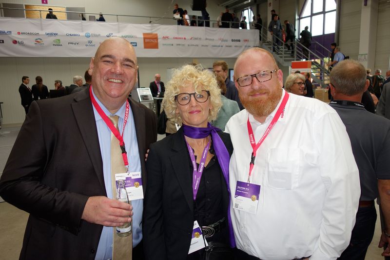 (l.) Oliver Gorges, cop software + services, Jeannine Mannzmann, Wortmann, und Jörn Beckmann, comTeam. (Bild: IT-BUSINESS)