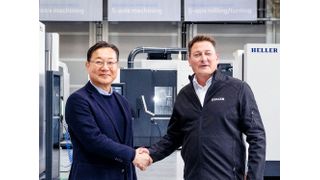 DN Solutions CEO Won-jong Kim (Left) with Heller CEO Thorsten Schmidt. (Source: DN Solutions)
