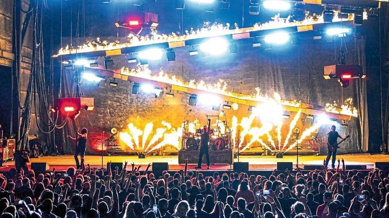 The linear burner system Fire Snake can create a 11 feet wide fire wall with flames individually adjustable in shape and height; a truss structure with winches allows angle adjustment of the units for dynamic stage designs.(Image: Steve Jennings)