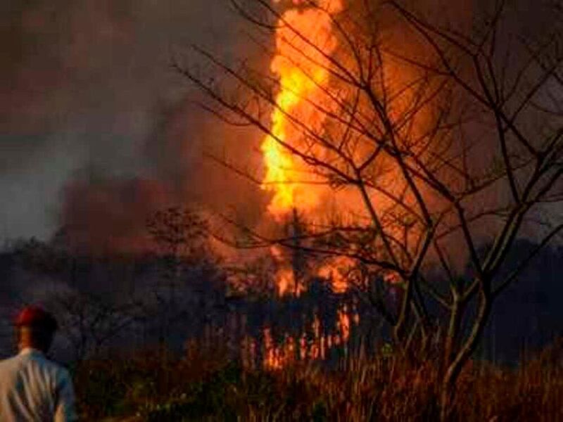 The massive fire at the oil well in Assam could be seen from 10 km away.  (PTI)