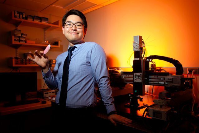 MIT graduate student Hyunwoo Yuk displays the double-sided tissue adhesive. (Tony Pulsone)