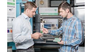 Scientific staff in IKV's injection moulding pilot plant. (Source: Geerd Jacobs)