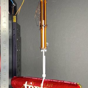 In laboratory demonstrations, individual FiberMotors were able to support stationary loads of about 75 grams. Four motors working in tandem generated enough force to lift a 46-gram chocolate bar and bend a cable-actuated robot finger.(Source:  EPFL)