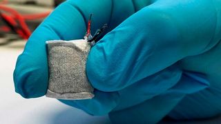 The prototype of the fuel cell was developed at the Department of Biosystems at ETH Zurich. It is wrapped in a fleece and slightly larger than a thumbnail. With this fuel cell, future medical devices such as insulin pumps could be operated on the body. (Image: Fussenegger Lab / ETH Zurich)