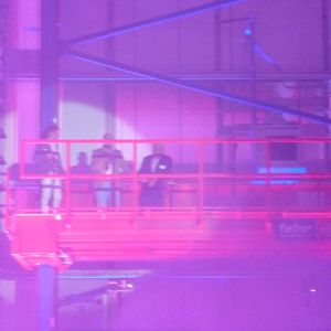 Moderator Kultstadionsprecher André Scheidt, Trompeter Bruce Kapusta und Erwin Schierle weihen das neue Hochregallager in Neuss ein.