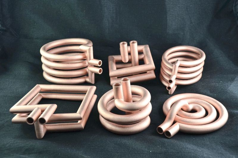 Induktionsspulen aus dem 3D-Drucker: Online konfigurierte Induktionsspulen aus elektrisch hochleitfähigem Kupfer bieten zahlreiche Vorteile. (Protiq)