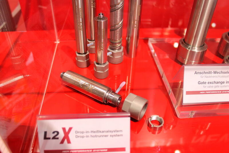 Ewikon's L2 X Drop-in hot runner system features screwed-in nozzles with coil heaters which are directly integrated into precision-machined cutouts in the melt bearing pressure tube. (Source: Schulz)