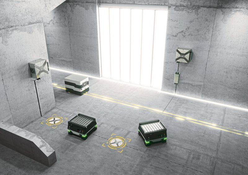 Soll sich ein mobiles System entlang einer Spur bewegen, kommt zur permanenten Energieversorgung das Linienleitersystem Movitrans line (oben) zum Einsatz. Bewegen sich die Fahrzeuge aber frei im Raum, bietet das Punktladesystem Movitrans spot mit Energiespeichern die nötige Freiheit. (Bild: SEW-Eurodrive)
