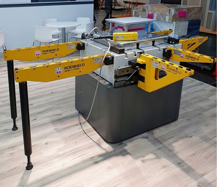 On the stand will be an example of Roemheld’s QDC (quick die change) product line, capable of accepting a tool delivered from the front or either side. (Source: Roemheld)