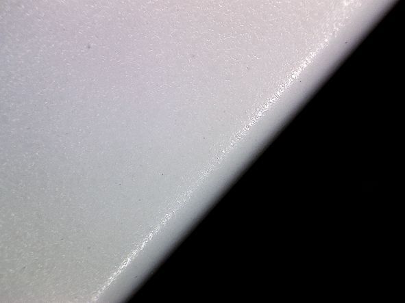 Bild „Kanten verrundet 3“ zeigt die einwandfeie Lackschicht in 50-facher Vergrößerung. Bild: Lissmac (Archiv: Vogel Business Media)