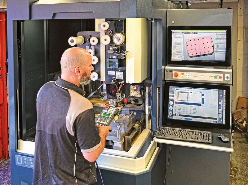 The Makino U32j wire-cut EDM machine on the shop floor at BM Injection, Whitchurch. On the right is the twin-screen control with HyperConnect remote connectivity to the mouldmaker's Open Mind CAM system (top). Below is Makino's process control screen.