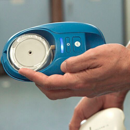 The U-Rhythm device and spool. The U-Rhythm device and spool.