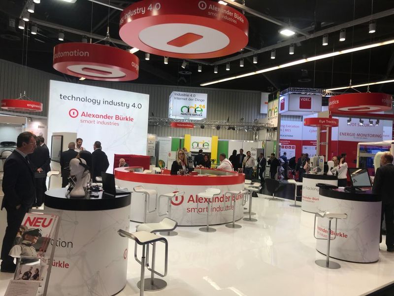 Alexander Bürkle

Das Freiburger Unternehmen Alexander Bürkle fokussiert sich bei seinem umfangreichen Produktportfolio auf verschiedene Bereiche. Zu den drei wichtigsten Highlights der Messe zählen zum einen der Digitale Zwilling eines Schaltschranks, der den internen Drahtverlauf digital abbildet und so eine direkte Aderbehandlung obsolet macht. Zum anderen präsentierte die Firma in Nürnberg Eye Tracking Produkte sowie Lösungen zur Augmented Automation, die es mit einer Datenbrille ermöglichen sollen, Wartungsservices digital durchzuführen.
Mehr Informationen unter www.alexander-buerkle.de
 (Vogel Communications Group)