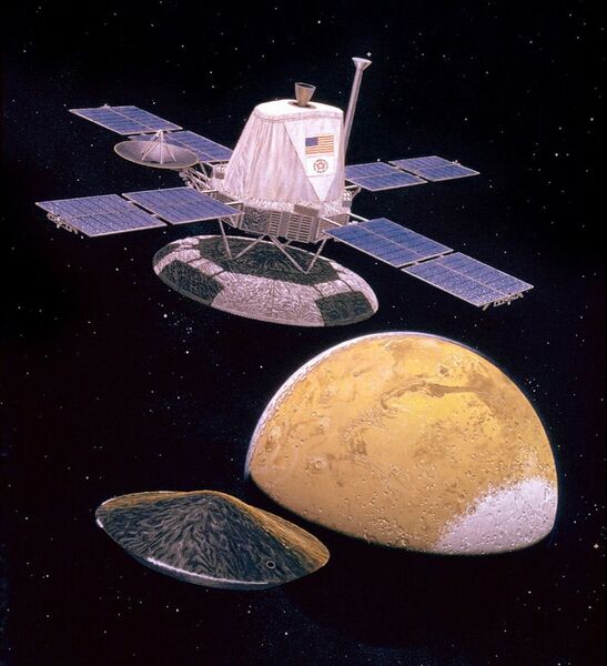 Vue d’artiste de la sonde martienne Viking 1. Au centre l’orbiteur qui comme son nom l’indique reste en orbite martienne. La sonde planétaire équipée de ses boucliers est juste en dessous, c’est elle qui se posera à la surface de la planète rouge et enverra sur Terre les premières images de la surface de Mars.  Viking 1 est le nom de la première des deux sondes du programme Viking envoyées en 1975 vers la planète rouge. Il fut le deuxième vaisseau interplanétaire (5 ans après Mars 3 sonde soviétique) à se poser sur Mars et à réussir sa mission. Viking 1 détenait le record de la plus longue mission martienne avec 6 ans et 116 jours, depuis l'atterrissage, jusqu'à la fin de la mission (en temps terrestre), avant d'être battu par les robots Spirit et Opportunity. (Image:Nasa)