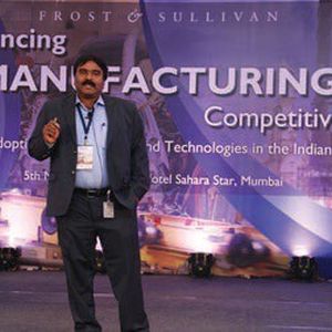 Corporate Project Manager, Coca-Cola India, M Ramesh Babu making a presentation to the audience.