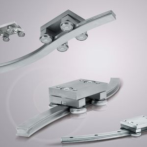 Der Laufwagen der Bogenführung hält die gewünschte Vorspannung auf dem gesamten Schienenverlauf, ob gerade oder gebogen.