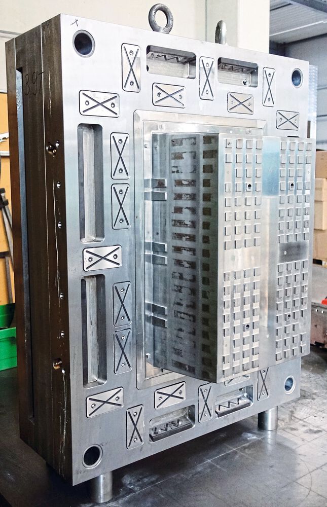 One half of the injection moulding tool for an open-fronted storage box.
