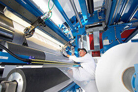 Bayer employee at a film-cutting machine in Dormagen (Picture: Bayer)