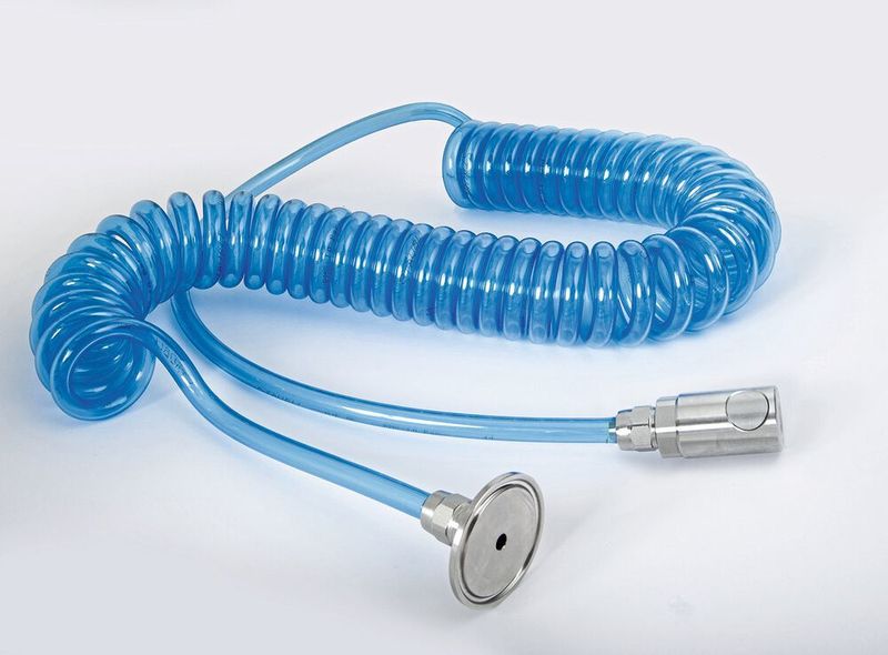 Komplettes Verbindungssystem für sichere und einfache Bedienung: Schnellkupplung, Clamp-Profil und Spiralschlauch. (Thiebaut/Stäubli)