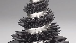 Simulation of ferrofluid literally climbing up a magnetized steel helix. (Kaust)