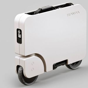 Zusammengeklappt sieht der Motocompacto wie ein Koffer mit Rollen aus.(Bild:  Honda)