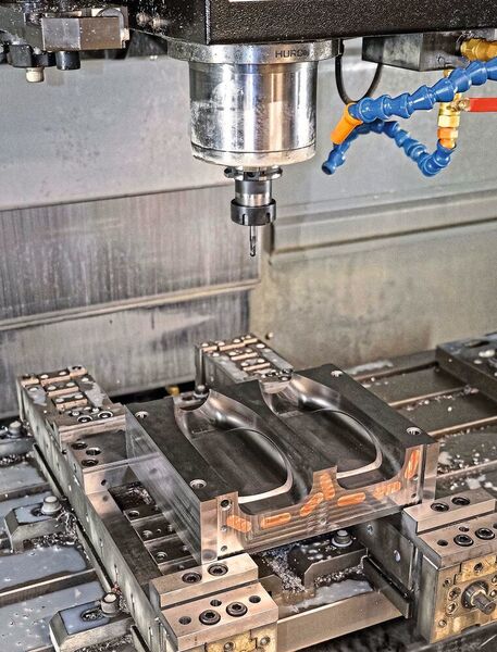 Close-up of stainless steel mould halves being produced on the Hurco VM30i. They are able to manufacture two million plastic bottles, ten times more than aluminium. (Hurco)