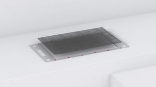 Fixierung einer Gas-Diffusionsschicht auf einem Rahmen, flüssiges Tape zur Illustration magenta eingefärbt. (Bild: Delo)