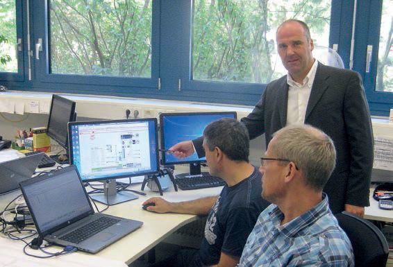 Head of Production Engineering, Cht. R. Beitlich, Günther Schätzle and members of his engineering team work on project planning. Change management was a core element of the stepwise migration plan. (B&R Industrial Automation)
