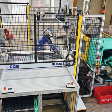 The overall system includes the palletizing system, the robot, and the transfer station. (Image:EGS Automation)