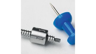 Größenvergleich: ein Miniatur-Kugelgewinde-
trieb (Ø 3 mm) und eine herkömmliche Pin-Nadel. (Steinmeyer)