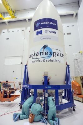 Sentinel-2A being encapsulated within the half-shells of the Vega rocket fairing. (Image source: ESA)